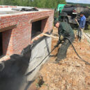 Ремонт фундамента кирпичного дома